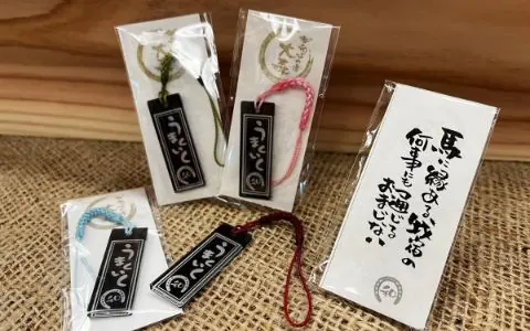 Umaku-iku wooden good-luck charm